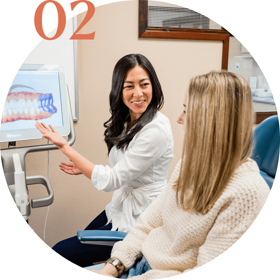 doctor showing patient his orthodontic scans